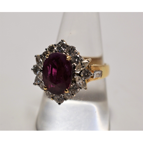 42 - 18ct yellow gold Ruby and diamond cluster ring, set with central oval ruby of approximately 4ct, sur... 