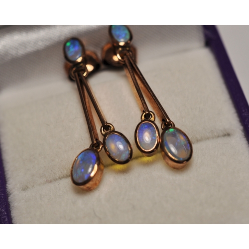 97 - Rose gold and opal double drop stud earrings, with butterflies stamped 375