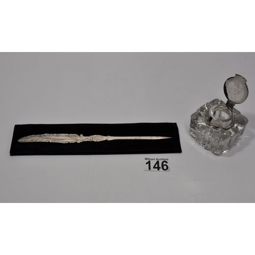 146 - A Dutch silver letter opener in the style of a feather hallmarked Gouda c.1999 together with glass i... 