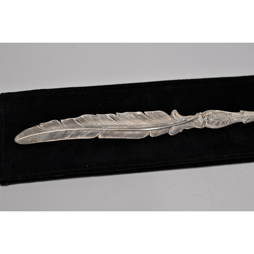 146 - A Dutch silver letter opener in the style of a feather hallmarked Gouda c.1999 together with glass i... 