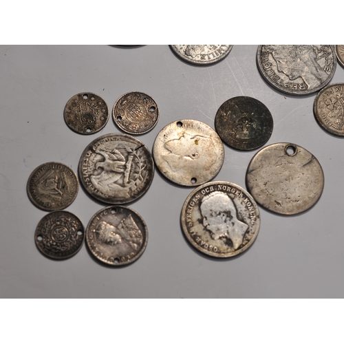 190 - A quantity of various British coins and others from around the world to include some silver coins