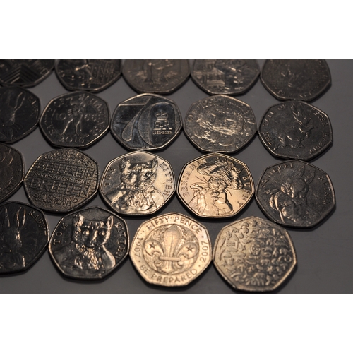 191 - 50 pence piece coins (x29) to include Beatrix Potter themed coins, Paddington, Benjamin Britten, She... 