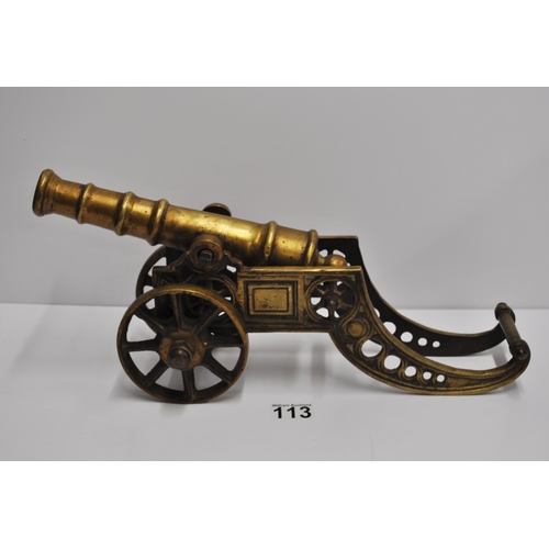 113 - A vintage brass table cannon on carriage, approx. 46cm x approx. overall height 26cm