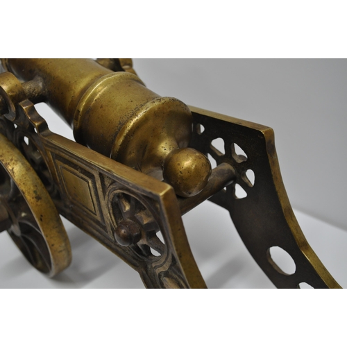 113 - A vintage brass table cannon on carriage, approx. 46cm x approx. overall height 26cm