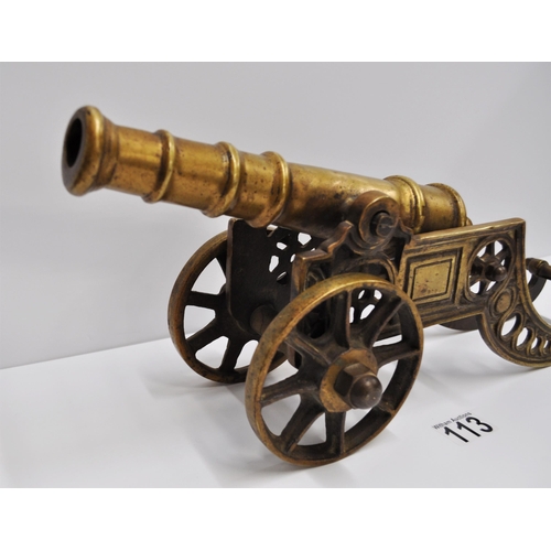 113 - A vintage brass table cannon on carriage, approx. 46cm x approx. overall height 26cm