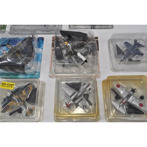 12 - Group of 1:10 and 1:72 scale diecast model aircraft (in unopened plastic sleeves) to include Spitfir... 