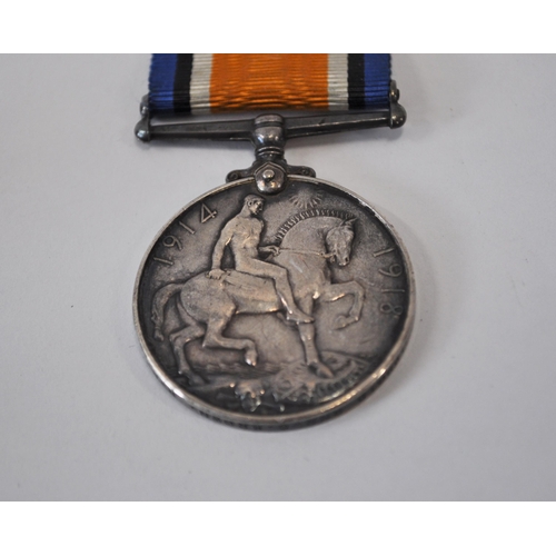 128 - A pair of WWI medals attributed to 198019 GNR.C.BROWN. R.A. together with x2 military cloth badges a... 