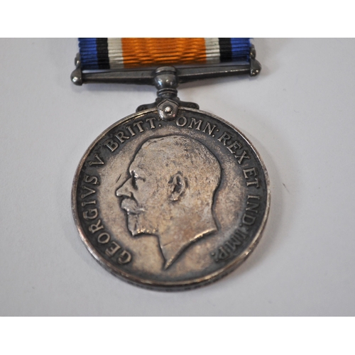 128 - A pair of WWI medals attributed to 198019 GNR.C.BROWN. R.A. together with x2 military cloth badges a... 