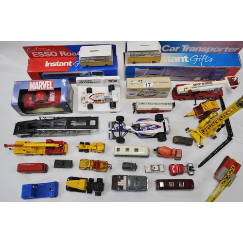 17 - A Large quantity of diecast vehicles including  buses, lorries, cranes, emergency services and Formu... 