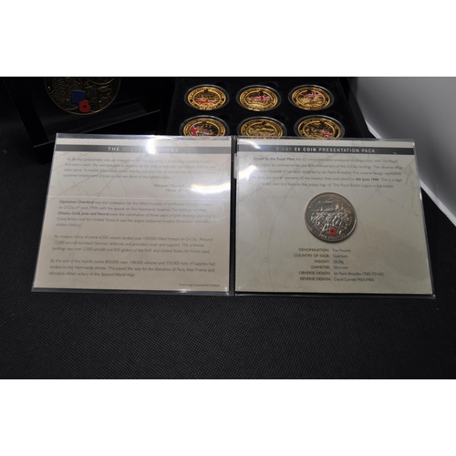 195 - Group of military themed coins and medallions to include D-Day 70th anniversary commemorative Crown ... 