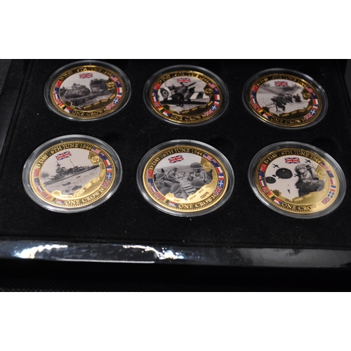 195 - Group of military themed coins and medallions to include D-Day 70th anniversary commemorative Crown ... 