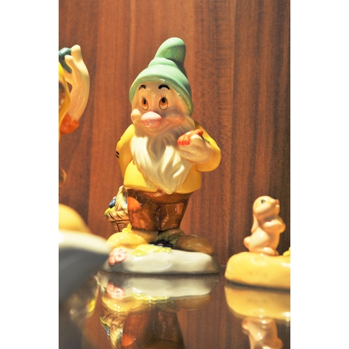 25 - Walt Disney Showcase ceramic figures - Snow White Fairest One of All,   the Seven Dwarfs and Take th... 