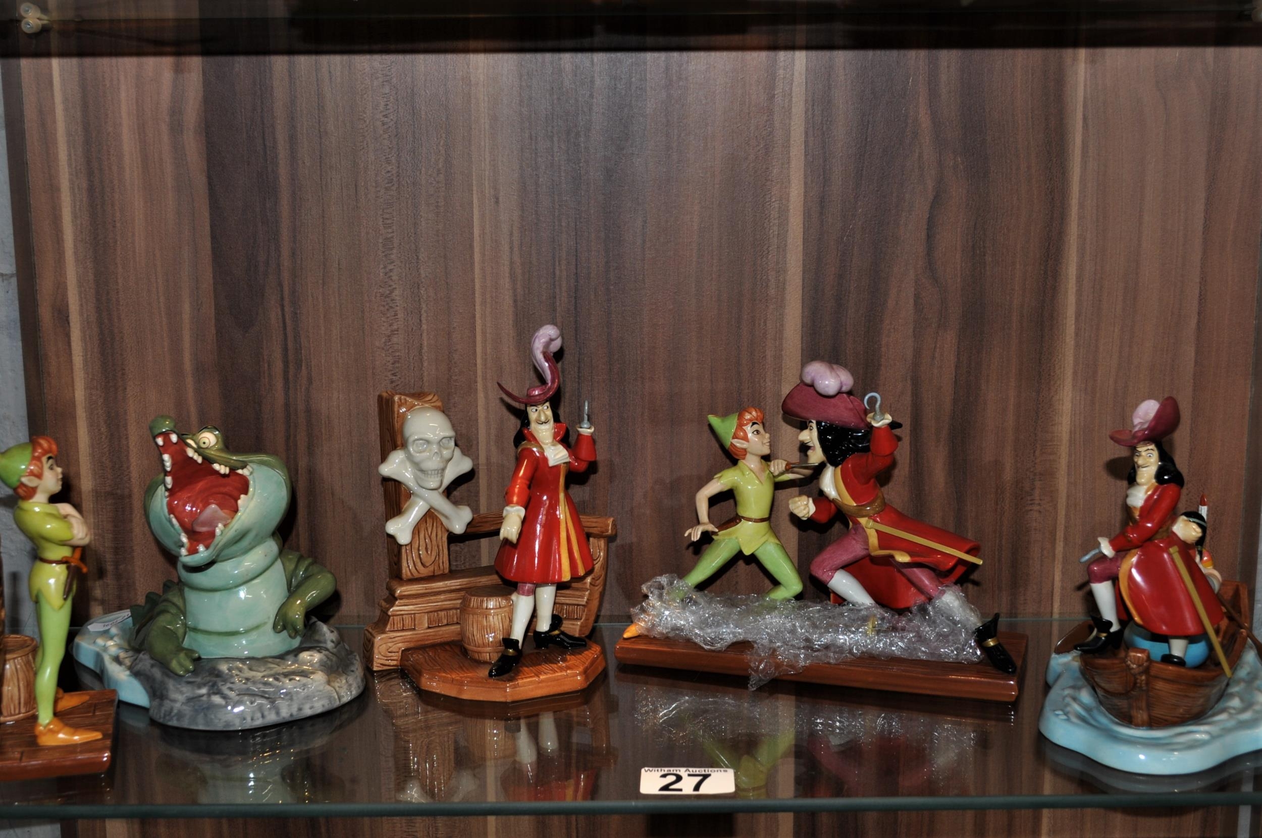 Group of Disney's Showcase Hook figures - Tic Toc, Peter Pan, Captain Hook,  Heading for Skull Roc