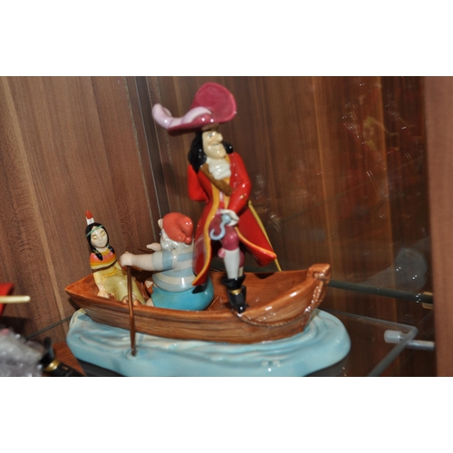 Group of Disney's Showcase Hook figures - Tic Toc, Peter Pan, Captain Hook,  Heading for Skull Roc