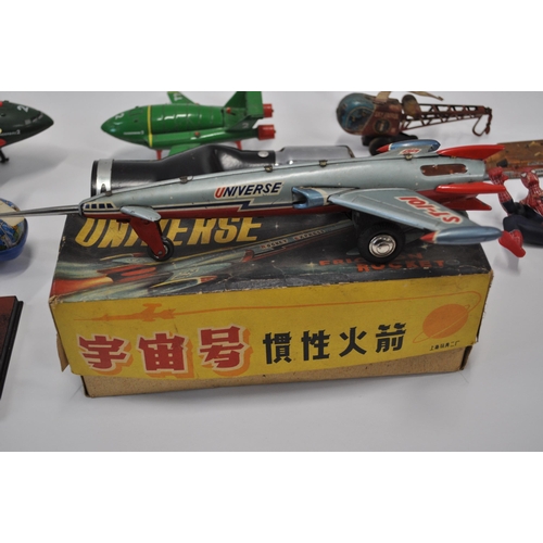 39 - A collection of different aircraft models and action figures to include Spiderman, Thunderbirds, Roc... 