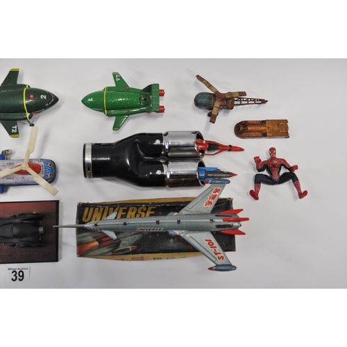 39 - A collection of different aircraft models and action figures to include Spiderman, Thunderbirds, Roc... 