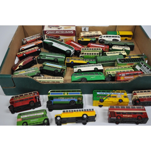 4 - A quantity of diecast and other models of bus and coaches to include a Corgi Live and Let Die bus