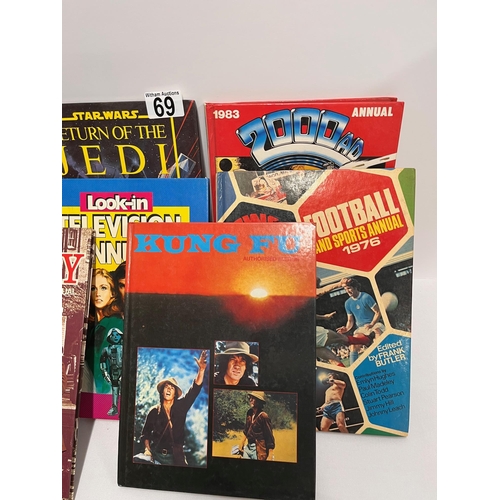 69 - A collection of different annuals from years starting from 1976 to include Star Trek, Star Wars, 200... 