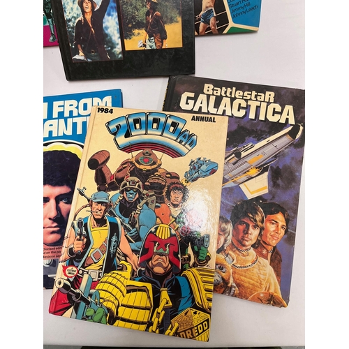 69 - A collection of different annuals from years starting from 1976 to include Star Trek, Star Wars, 200... 