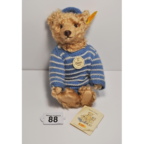 88 - Steiff 1907 classic teddy bear in a knitted sweater set and hat, fully jointed with box