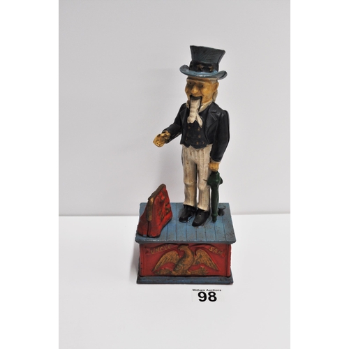 98 - A vintage cast money box/bank depicting Uncle Sam, no stopper