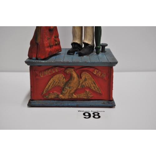 98 - A vintage cast money box/bank depicting Uncle Sam, no stopper