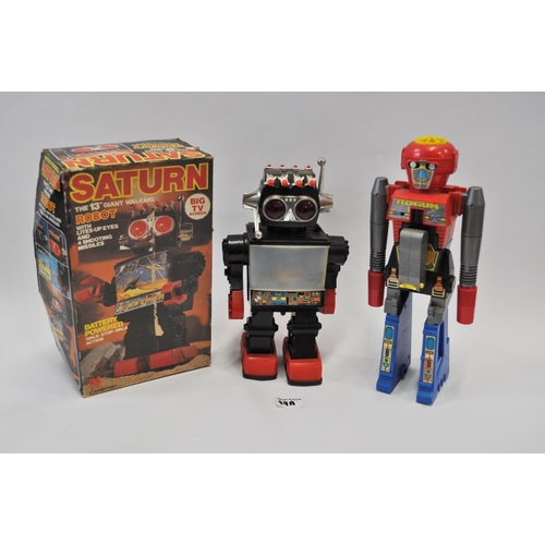 99A - A boxed Saturn robot made by Kamco, together with one other robot, batteries working at time of cata... 