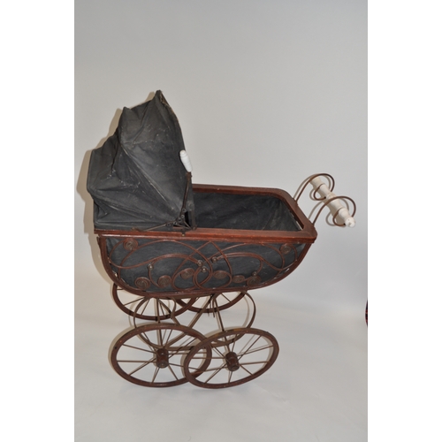 94 - Victorian style pram with hood and ceramic style handles