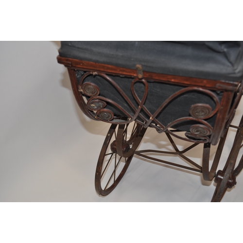 94 - Victorian style pram with hood and ceramic style handles