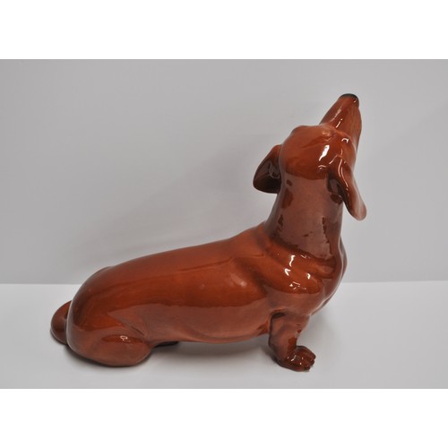 1 - A Beswick fireside ceramic figure of Dachshund, approx H27cm