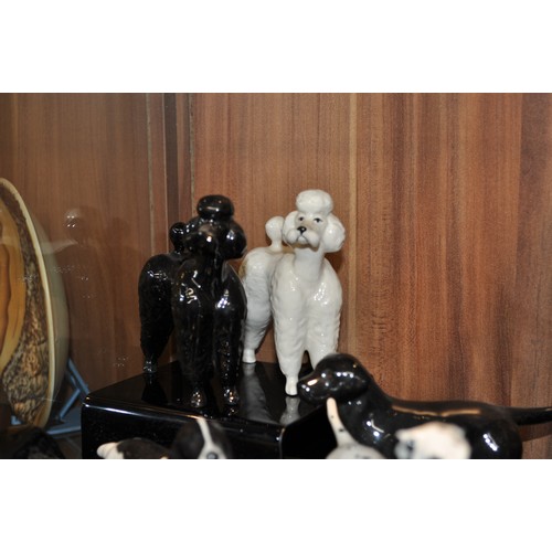 3 - A group of Beswick dogs to include dalmation and poodle X6 items in total