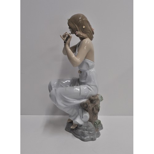 24 - Lladro Graceful Tune model no. 06578, with original box