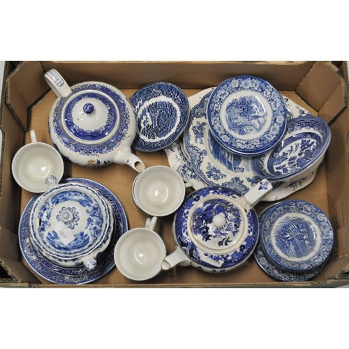 27 - A large quantity of mixed blue and white china to include teapots, terrines, plates, milk jugs, teac... 