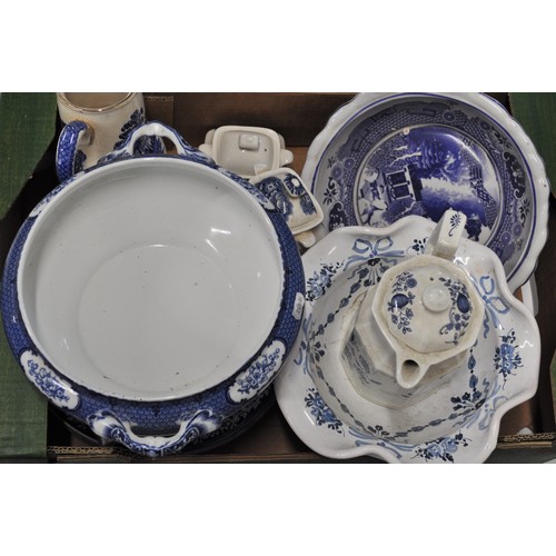 27 - A large quantity of mixed blue and white china to include teapots, terrines, plates, milk jugs, teac... 