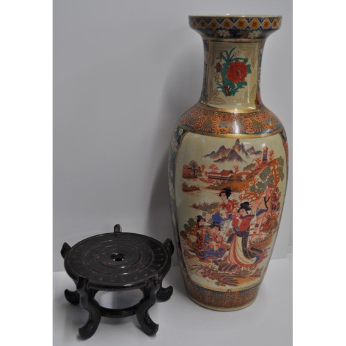 32 - Japanese Imari style urn vase with family scenes and colourful flora approx. 60cm tall, on stand