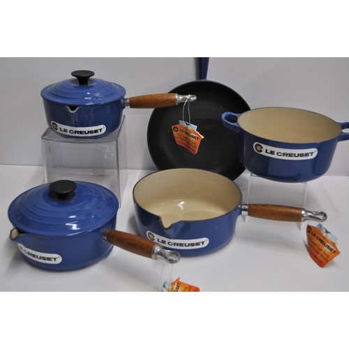 36 - Le Creuset Marseille Blue items including frying pan, petite casserole dish, and three graduated sau... 