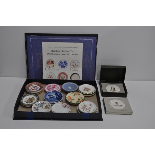 42 - Miniature plates of the world's great porcelain houses, with box and certificates.