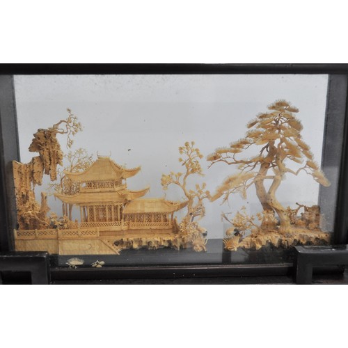 48 - A group of vintage oriental cork dioramas in display cases depicting pagodas and birds in landscape ... 