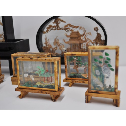 48 - A group of vintage oriental cork dioramas in display cases depicting pagodas and birds in landscape ... 