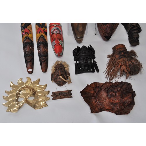 52 - A collection of different masks, some in African style. Composed of various materials, including woo... 