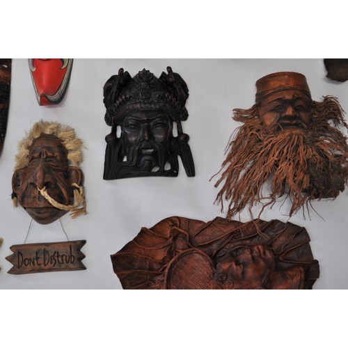 52 - A collection of different masks, some in African style. Composed of various materials, including woo... 