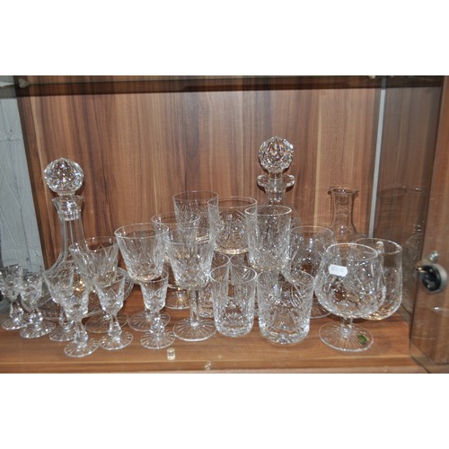 74 - Large quantity of various cut crystal glassware items, including Doulton and Waterford crystal bowls... 