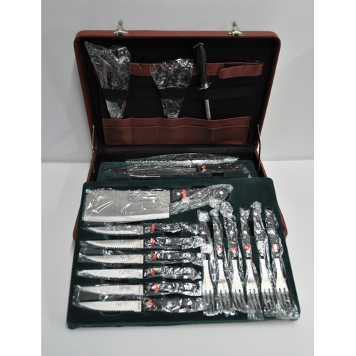 78 - A cased set of professional kitchen knives and equipment by Bachmayr Solingen