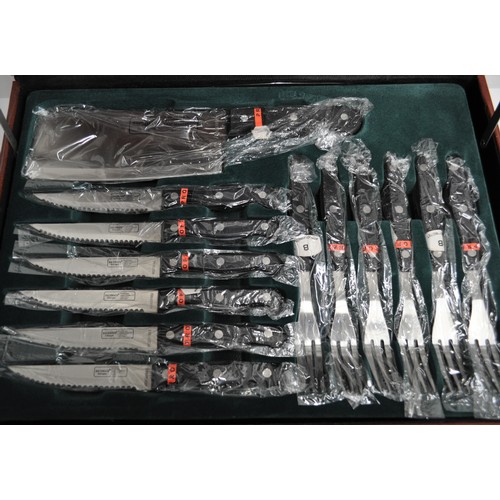 78 - A cased set of professional kitchen knives and equipment by Bachmayr Solingen