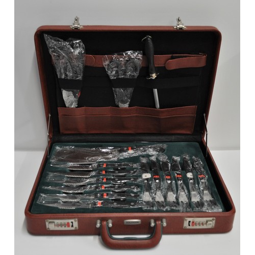 78 - A cased set of professional kitchen knives and equipment by Bachmayr Solingen