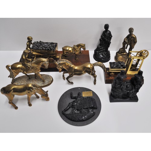 82 - A group of metalware figures consisting of horse and jockey figures and other mining related items, ... 