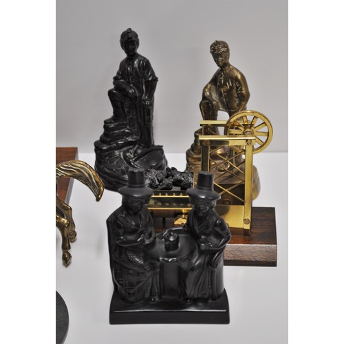 82 - A group of metalware figures consisting of horse and jockey figures and other mining related items, ... 