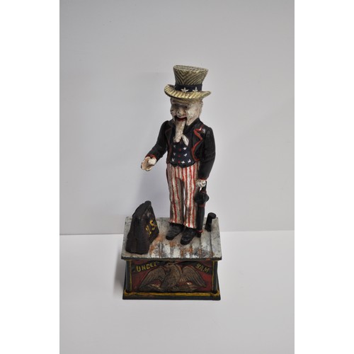 92 - Uncle Sam cast iron money box with contents