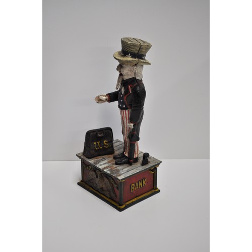 92 - Uncle Sam cast iron money box with contents