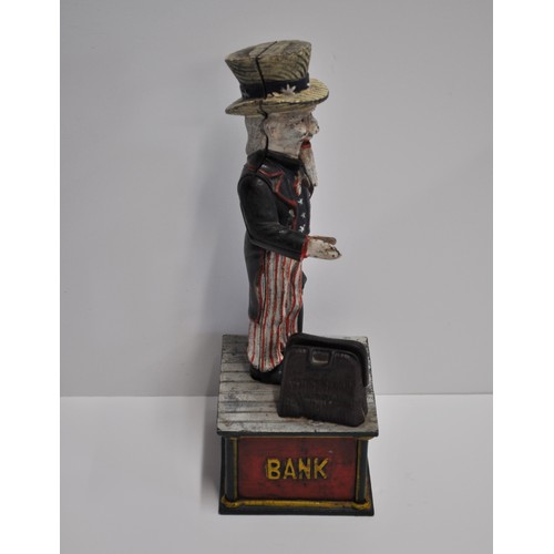 92 - Uncle Sam cast iron money box with contents